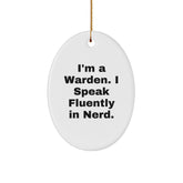 Warden Oval Ornament Gifts from Friends for Christmas - 'I'm A Warden. I Speak Fluently In genius.' Funny Quote Oval Shaped Ornament, White, 3.25'' Tall, MDF and High-Gloss Plastic Finish - Image 1